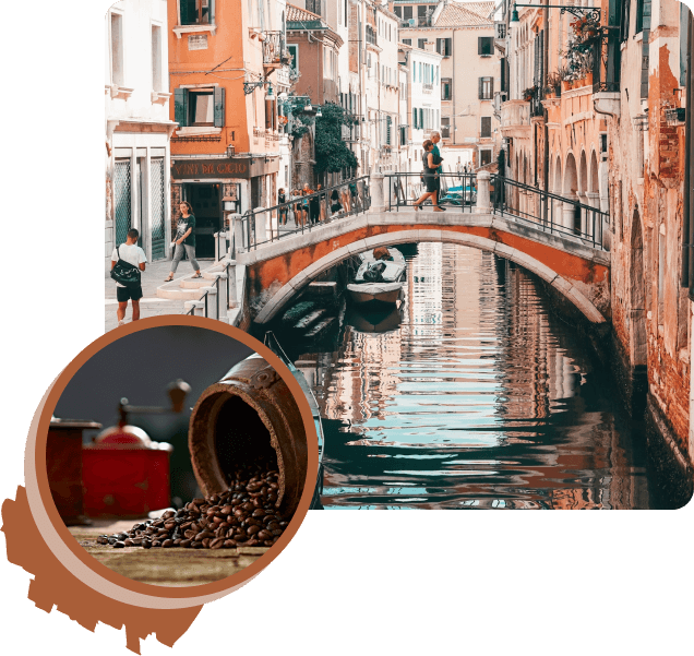 A street view of Venice with a canal, a bridge, and buildings with people walking.