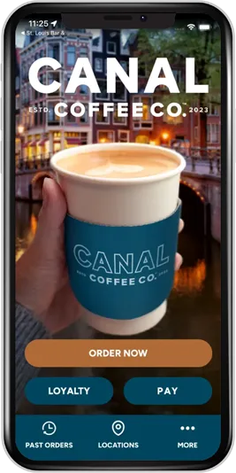 A phone displays the Canal Coffee Co. app. A person holds a coffee cup with the company logo.